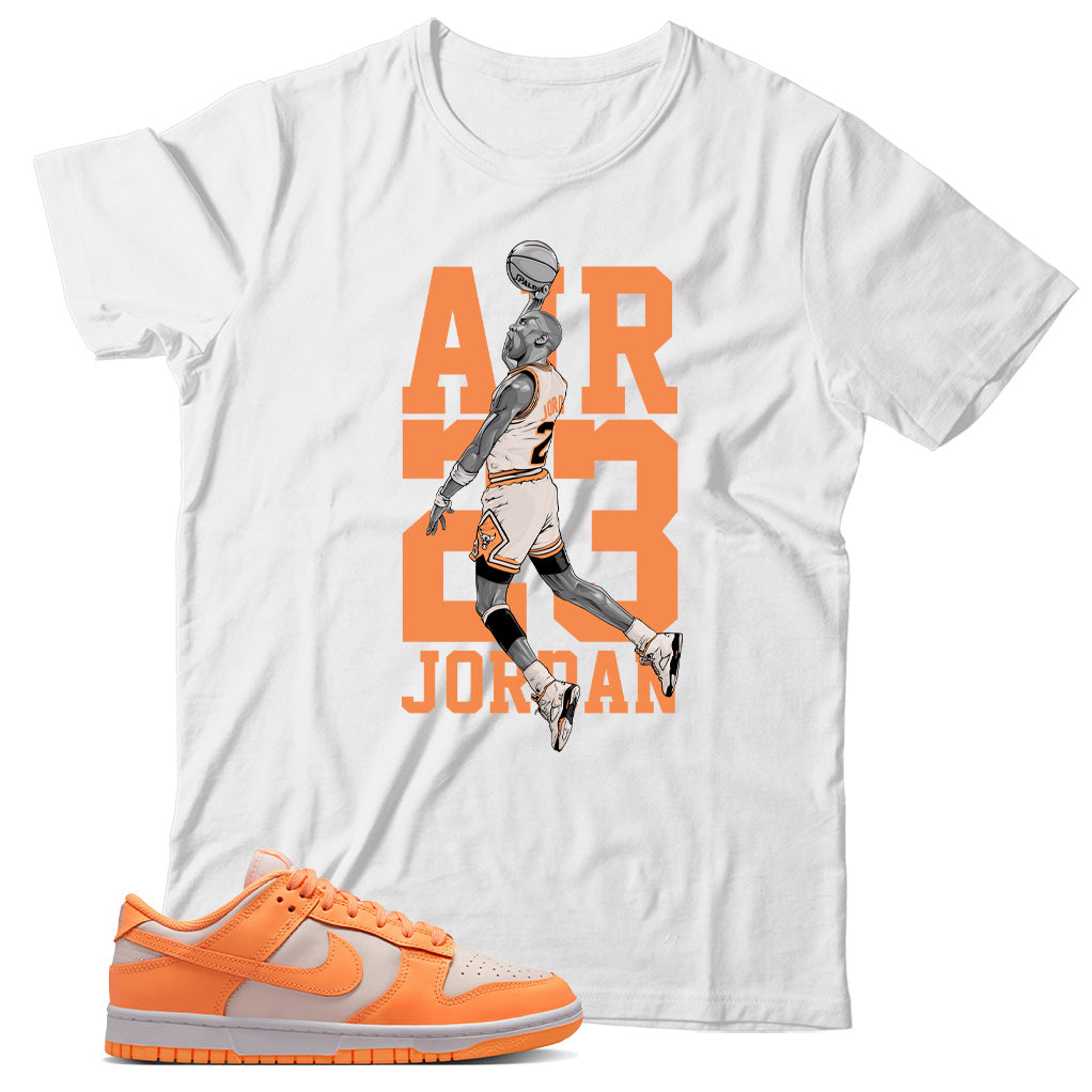 Nike Dunk Low Peach Cream shirt